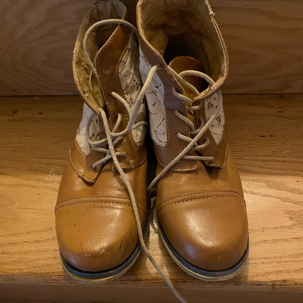 Tan lace-up boots
